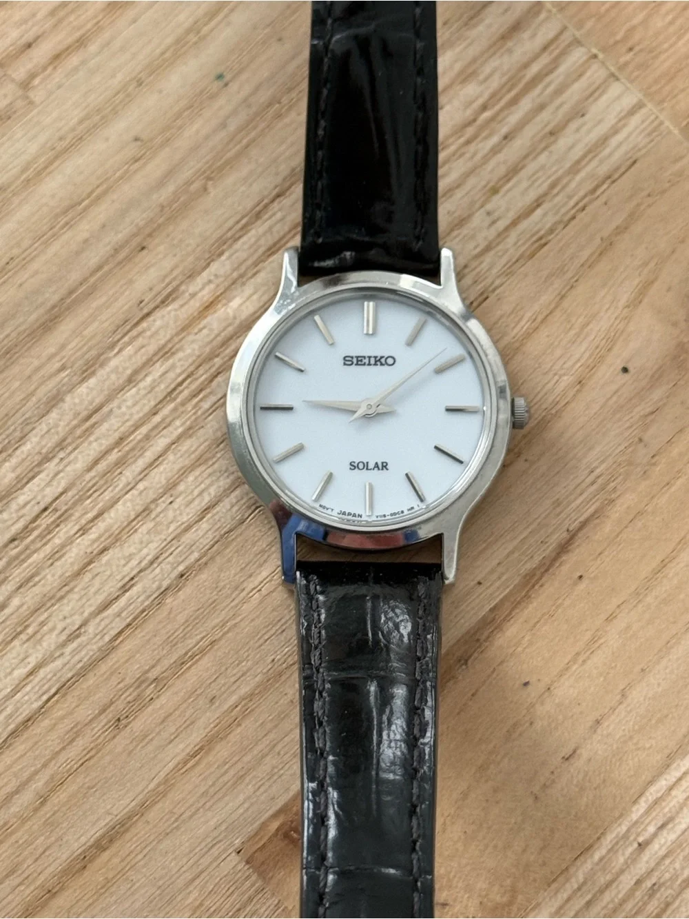 Seiko Solar Ladies Watch White Round Dial Black Leather Strap Stainless Case
